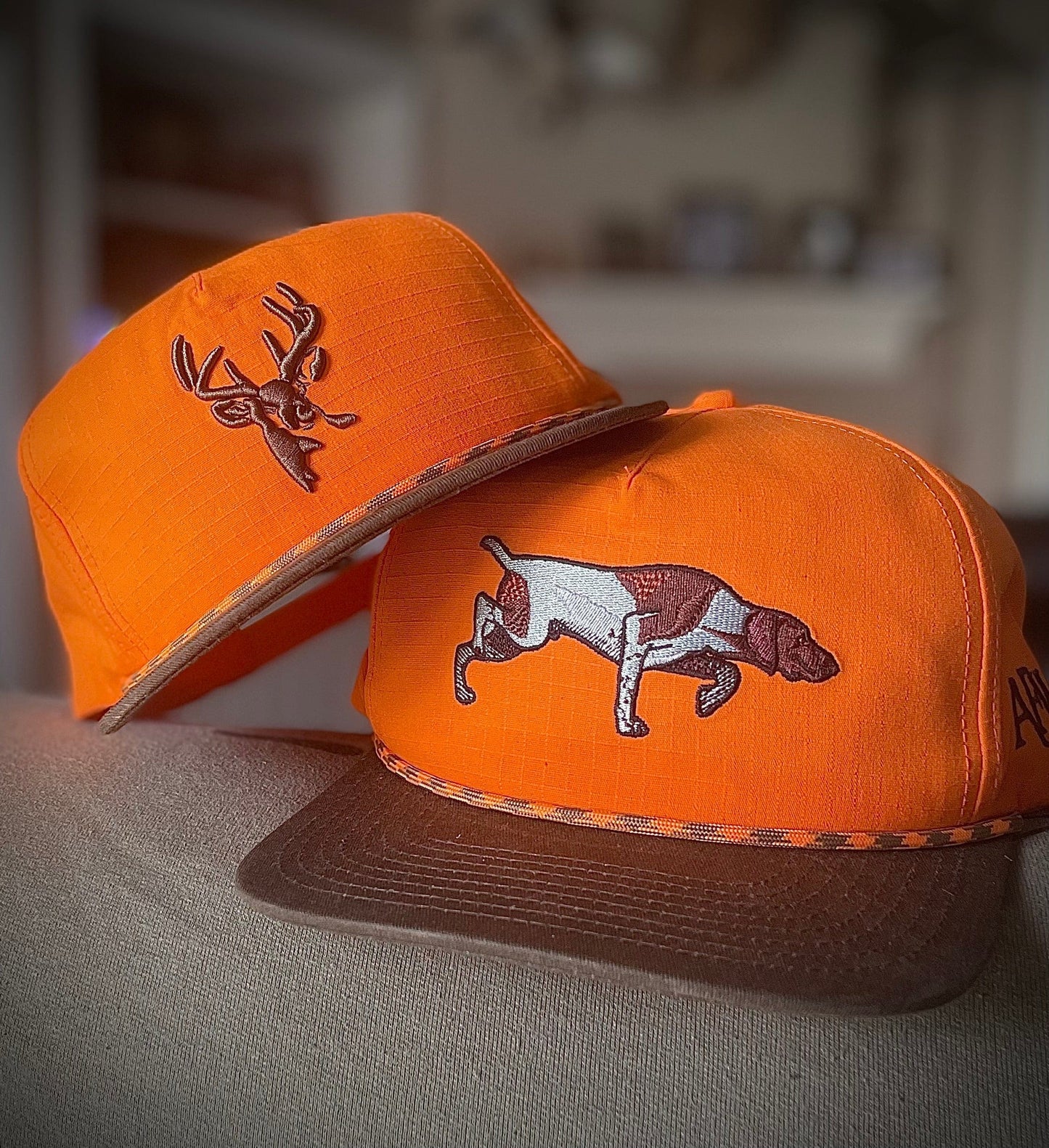 BLAZE ORANGE AND BROWN RIPSTOP PUFF DEER ROPE HAT